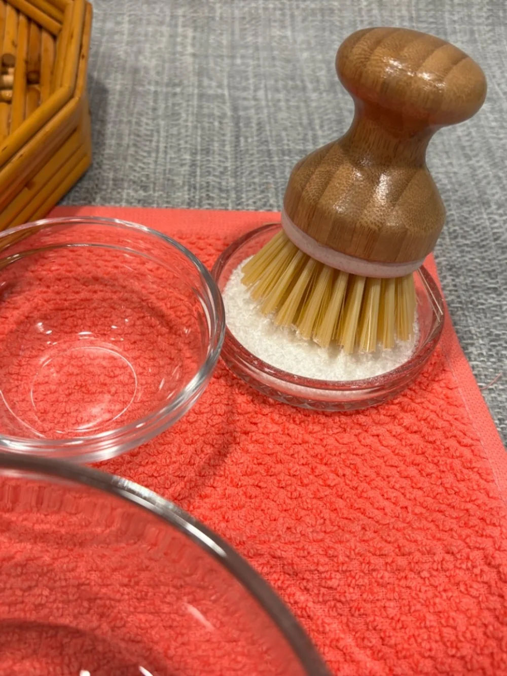 care of environment scrubbing a small object w/ seashell by idlewild montessori